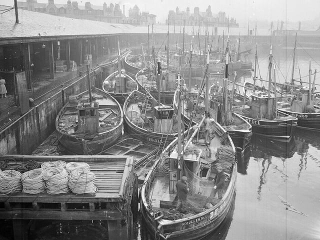 Fishing  boat tied up at the fish market at Aberdeen docks in October 1941.
