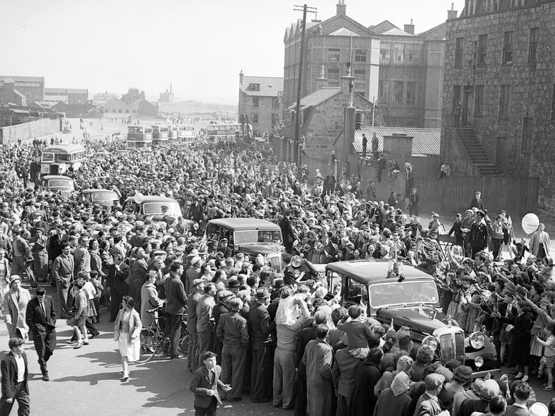 Crowds greet the Queen Mother in Aberdeen in May 1959.
