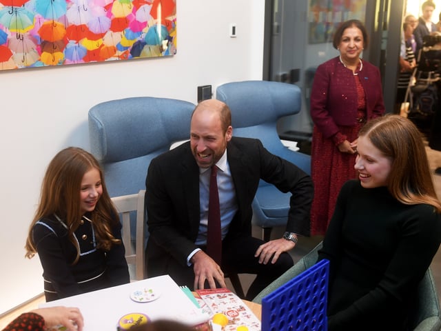 The Prince of Wales pictured chatting to Macy and Maya Burrow at the opening of the Rob Burrow MND Centre in Leeds. 
 

