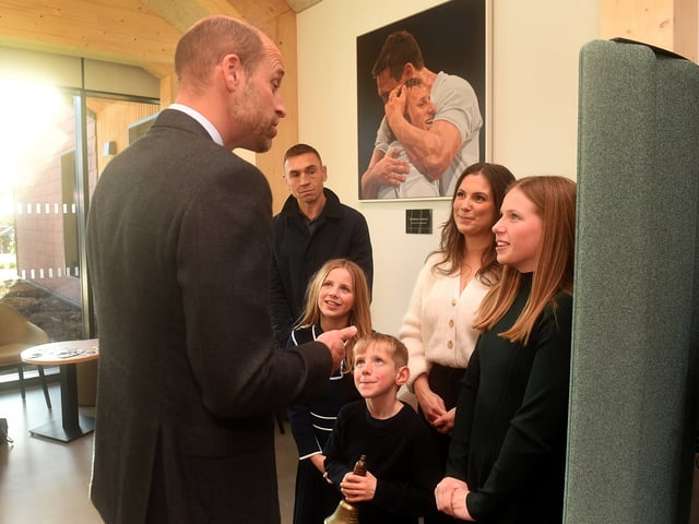 The Prince of Wales is pictured chatting to Lindsey Burrow with her children Jackson, Macy and Maya along with Kevin Sinfield at the opening of the centre in memory of Rob Burrow.
