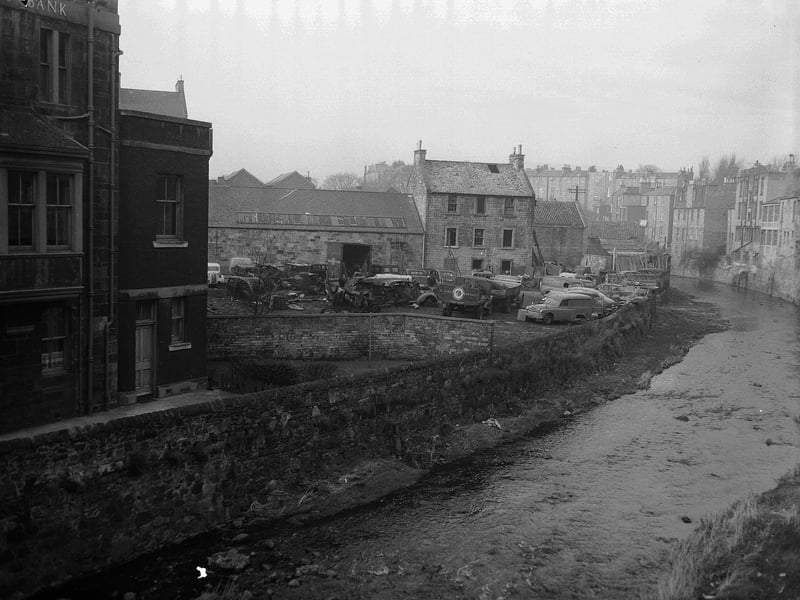 A scrap yard next to the Water of Leith in Stockbridge in March 1962.