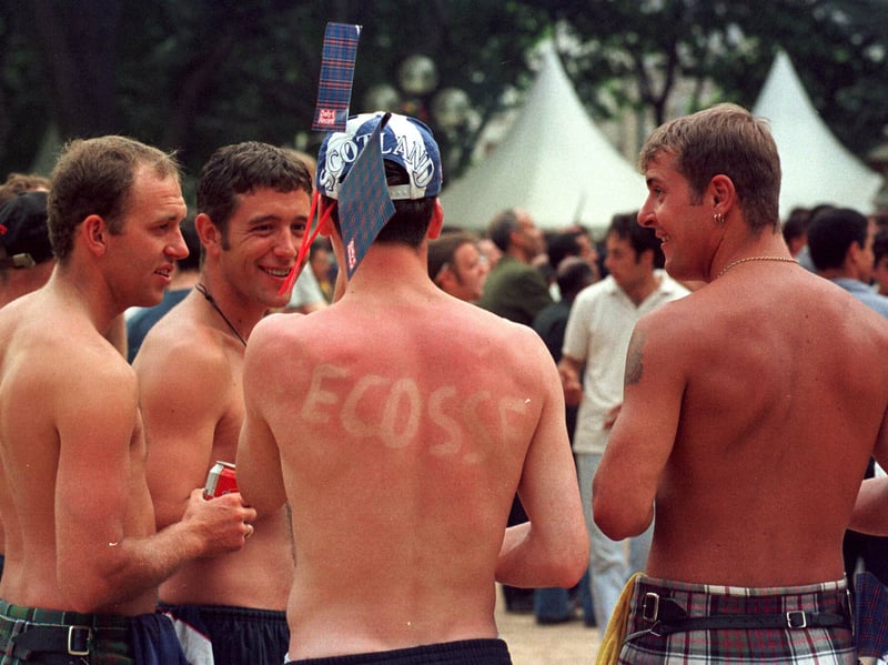 A Scotland fan shows off his sunburn patterned back in St Etienne ahead of the France 98 World Cup match against Morocco