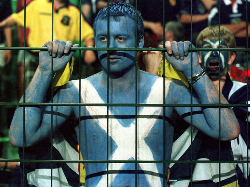 A disconsolate Scotland fan is pictured after they lost 3-0 to Morocco in St Etienne during the France 98 World Cup