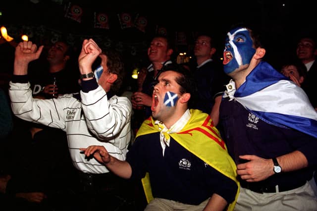 Peter and Derek Kelly, with Bob Slight, watch Scotland take on Morocco in the 98 World Cup, from the Haymarket pub