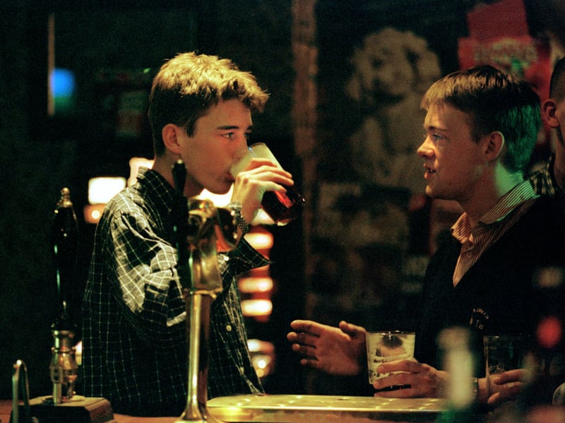Two men drinking in a Scottish & Newcastle pub in 1998