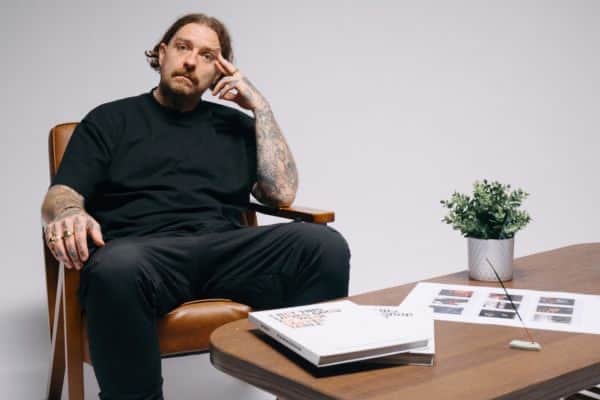 Arctic Monkeys original bassist Andy Nicholson with his book  I Bet This Looks Good on Your Coffee Table,