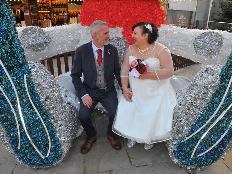 Newly-weds Craig and Rebecca Parker from Farnley enjoy the market in Millennium Square after their wedding in the Civic Hall.