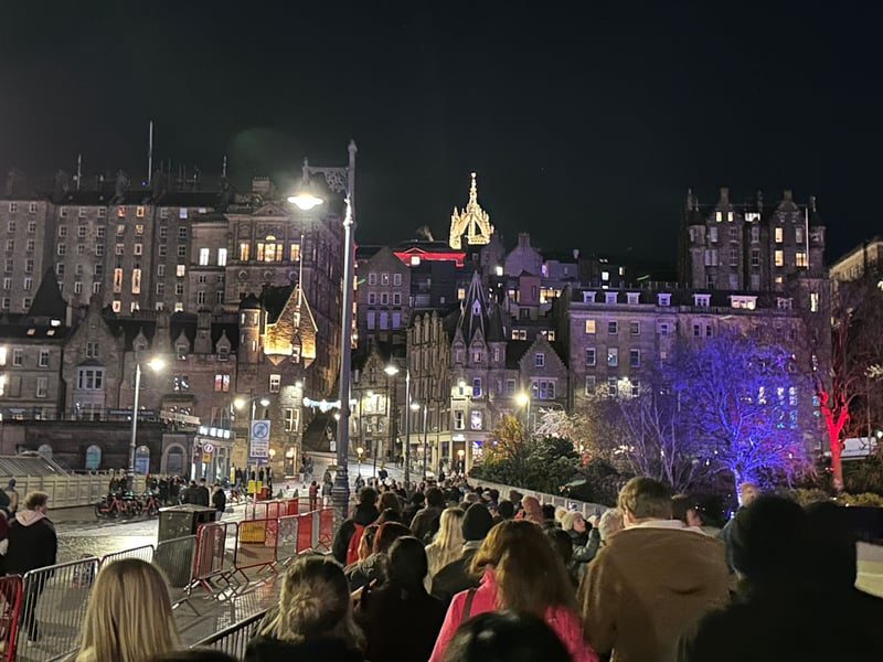 Locals and tourists queue on Waverley Bridge to visit the seasonal event