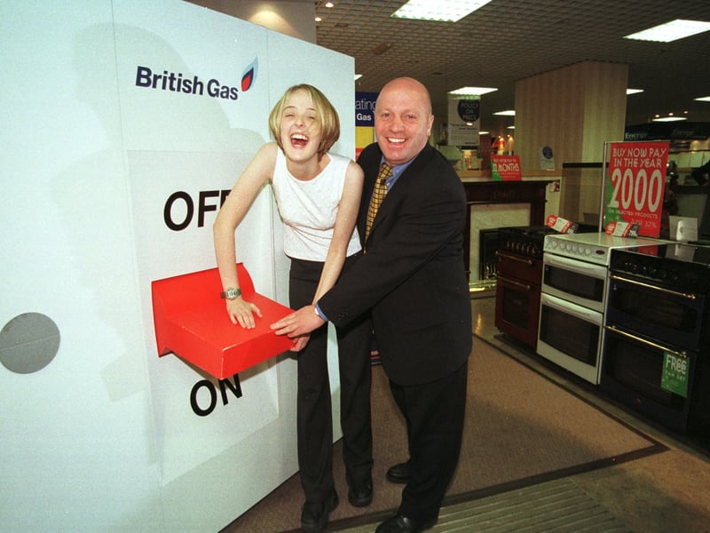 Radio Aire FM presenter Katy Kaboom turns on the electricity market for British Gas at their Eastgate showroom. She is pictured with area manager Paul Waite.