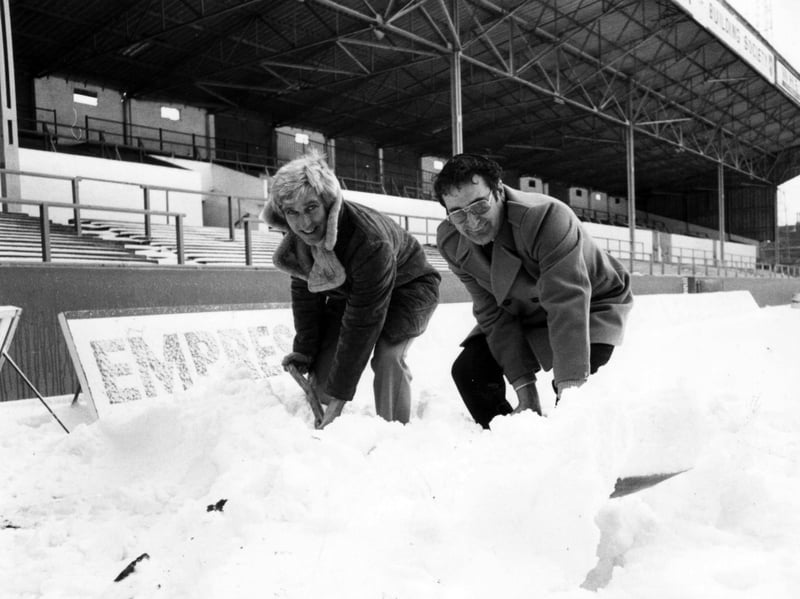 Pompey secretary Bill Davis and commercial manager Les Allen clearing snow at Fratton Park in 1982