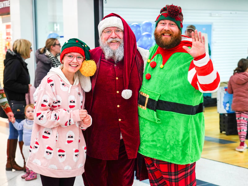 Pictured is Santa and helpers. Pictured by Alec Chapman