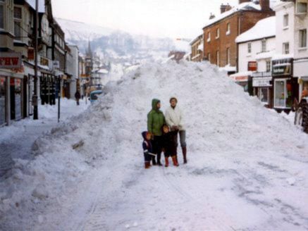 Standing in front of a huge mound of snow in Newtown in January 1982