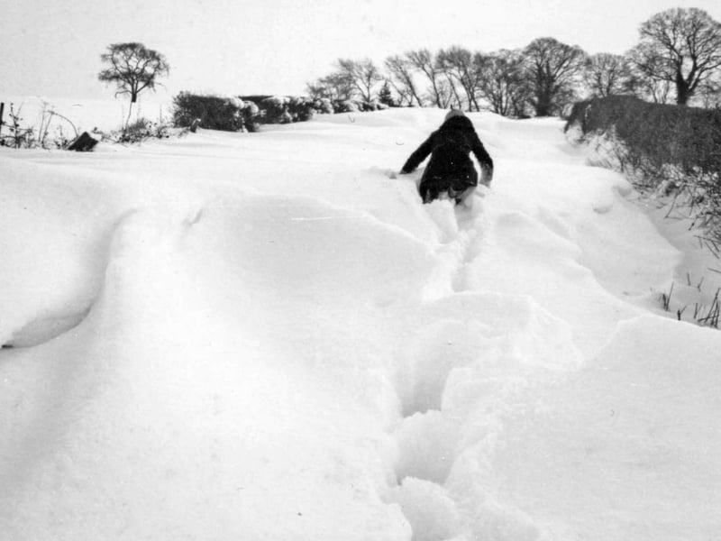 Struggling through the deep snowdrifts in Horton in January 1982