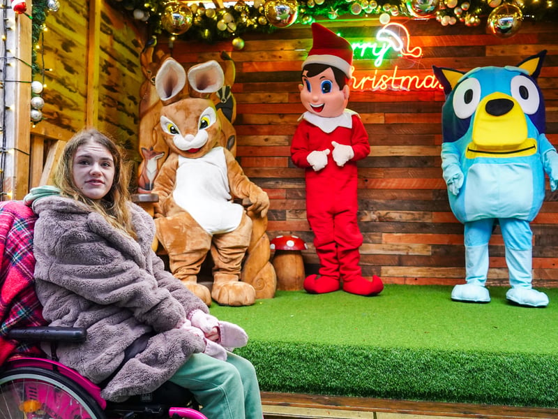 Pictured is Elyssa HL with Christmas mascots. Pictured by Alec Chapman