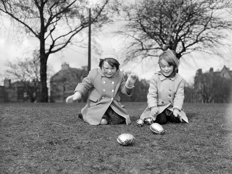 Easter eggs being rolled by Eileen and Gail Robertson in Bruntsfield Links April 1963.