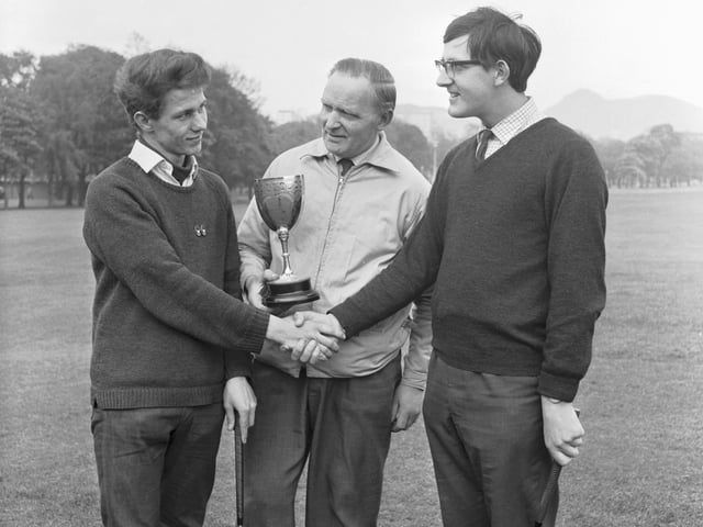 P. Gilzean receives the Edinburgh Corporation Golf Cup after beating Norman Inglis at Bruntsfield in May 1966.
