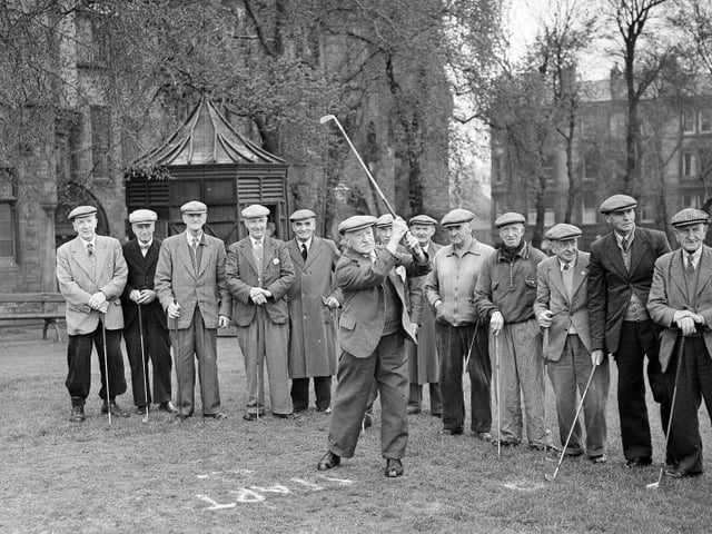 Mr R. Fotheringham, aged 90, the oldest member, drives off in the veterans' golf match at Bruntsfield Links Golf Course in May 1958.