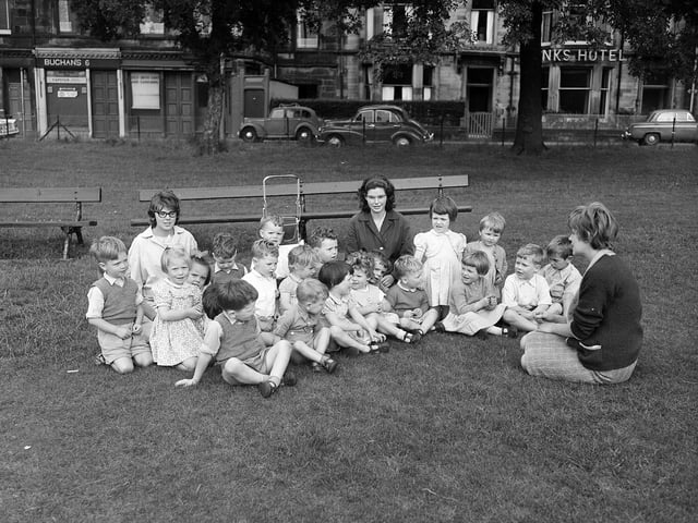 Children from the Canaan Lodge Childrens Home have a sing song on Bruntsfield Links in August 1963.