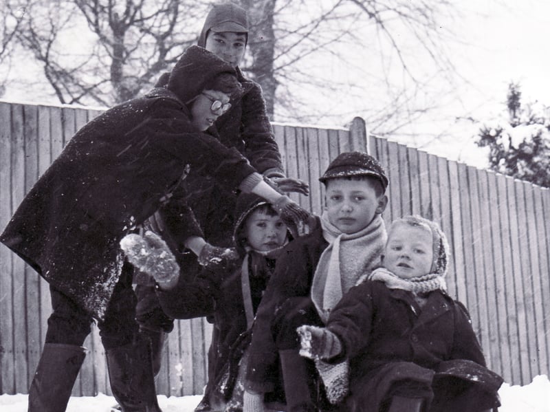 Children in Broomhill, Sheffield, get set for a sledge run in the thick carpet of snow in January 1963