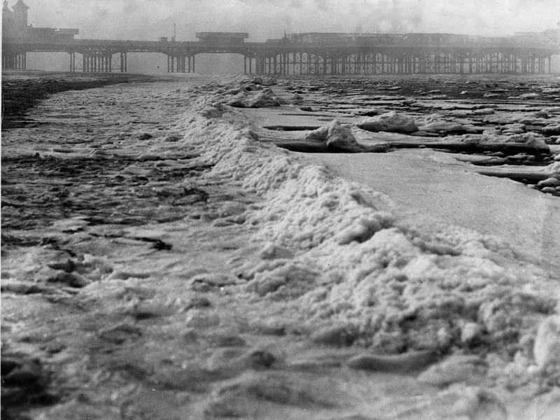 Blackpool beach looking like an 'Arctic wasteland' with frozen snow and ice-floes along its whole length in January 1963. This photo shows Central Beach and Central Pier.