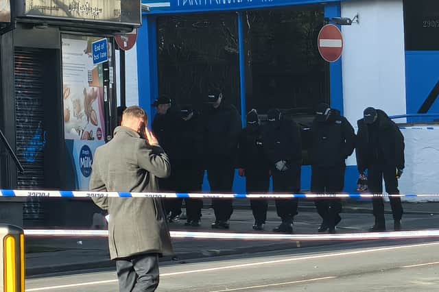 Police search London Road. Photo: Alastair Ulke