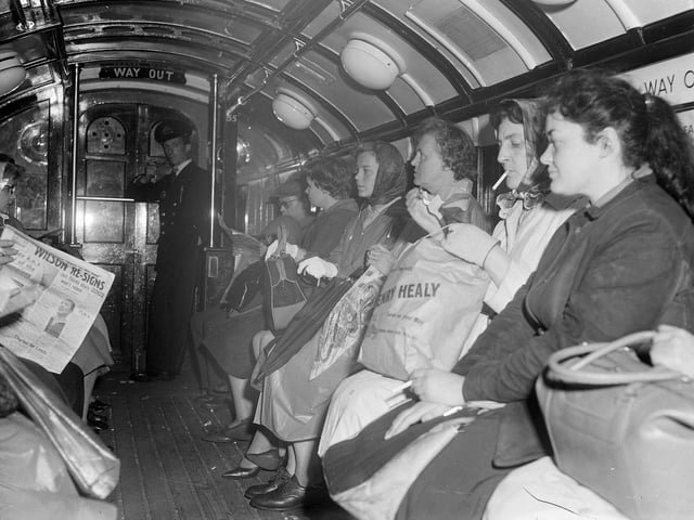 Glasgow housewives going home on the underground train after a day's shopping in 1962.
