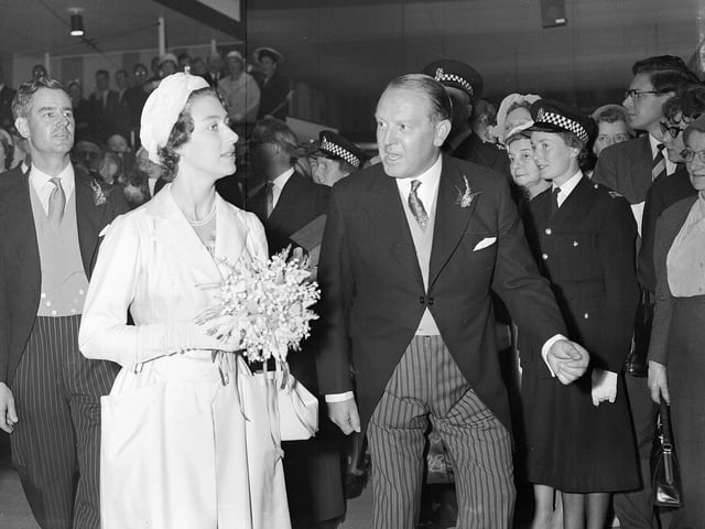 Princess Margaret opens the Scottish Industries Exhibition in Kelvin Hall in Glasgow, alongside Lord Polwarth and Sir Robert MacLean, in September 1959.
