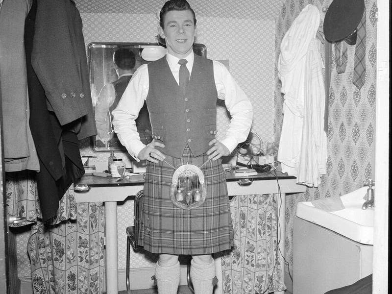 Andy Stewart singer in his dressing room at the Empire Theatre in August 1957.