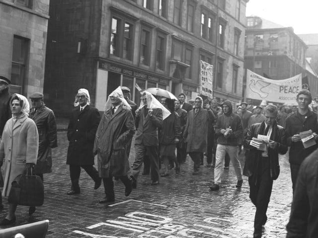 Anti-Vietnam protesters march to at a peace rally in Queen's Park, Glasgow in June 1966.