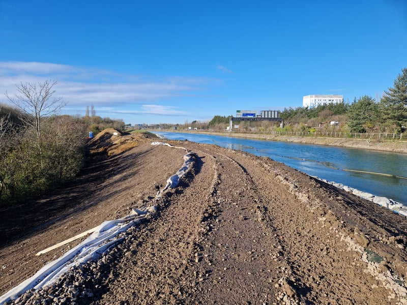 A new footpath is being created along the top of the embankment