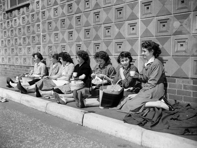 Workers have tea outside Michael Nairn and Co Linoleum factory in July 1958.