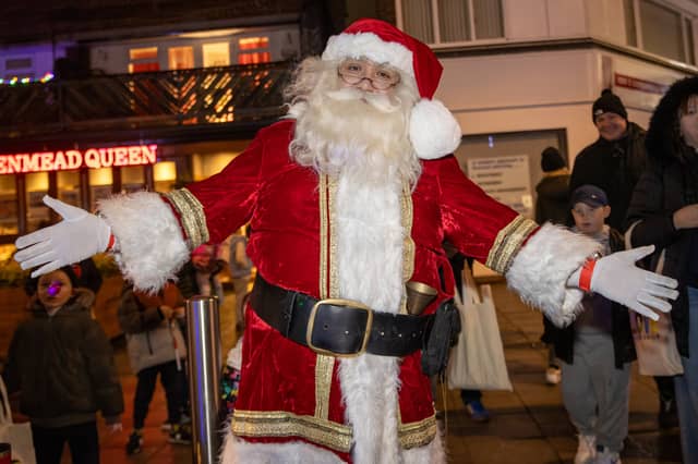 Santa Clause arrived to turn on the lights