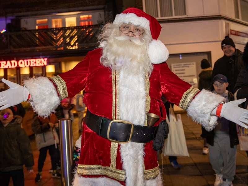 Santa Clause arrived to turn on the lights