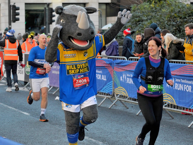 Leeds Rhinos Ronnie the Rhino enjoys the run. 