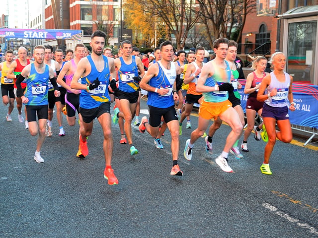 Start-to-finish winner James McMurray, yellow shorts, who won the race