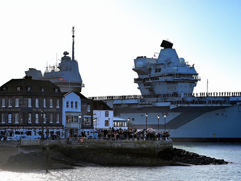 HMS Prince of Wales sailing past Spice Island en-route to HMNB Portsmouth.