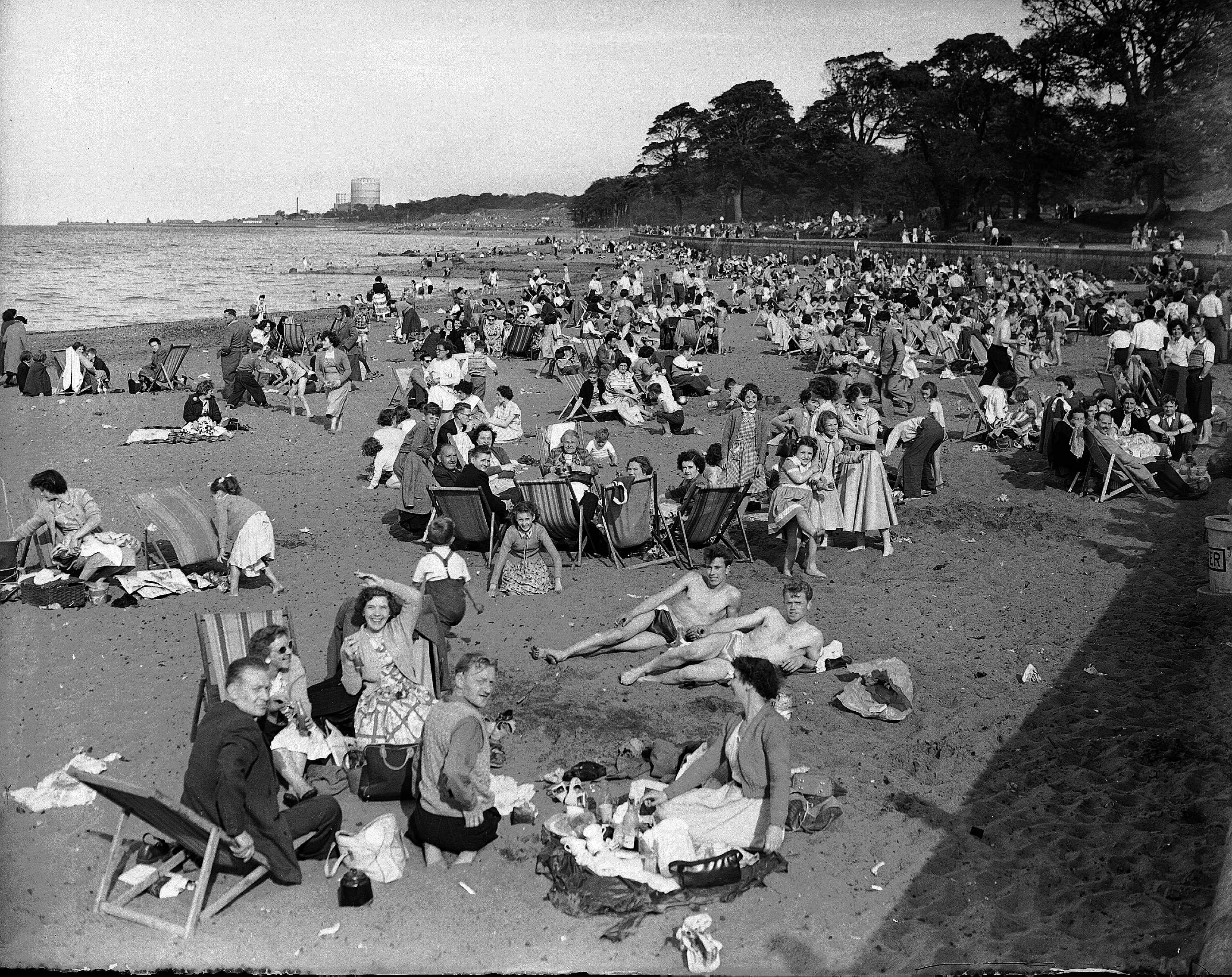 Holidaymakers at Cramond beach in July 1955.