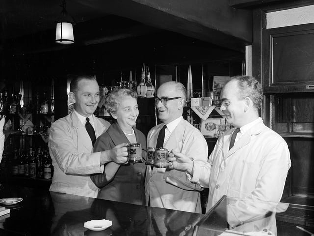 Owner Sam Proudfoot with his wife and two sons at The Cramond Inn in October 1959.