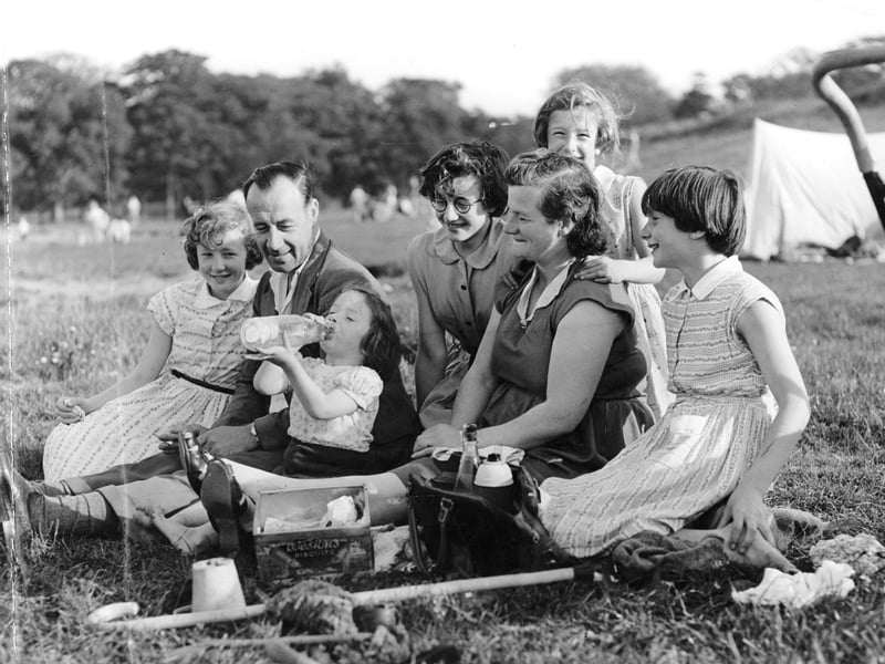A family enjoy a picnic at Cramond in September 1958.