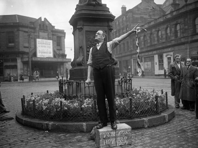 Paddy Fagan speaking at a General Election campaign at the foot of Leith Walk with the slogan 'Vote for Hoy our Boy' in May 1955.