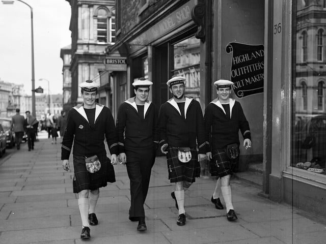 French sailors from submarine in Leith walking along Leith Walk in in kilts in May 1963.