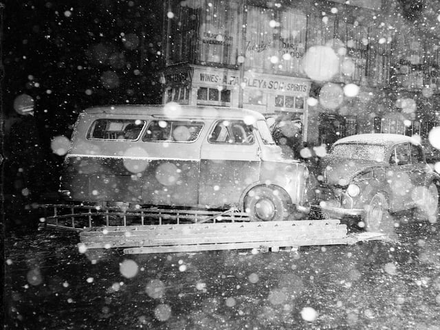 A van and car after a road traffic accident during a blizzard in Leith Walk in February 1960.