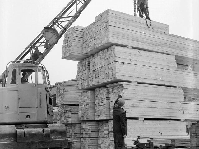 A new delivery arriving at F Mitchell Law Millais and Timber Merchants, at 234 Leith Walk in May 1960.