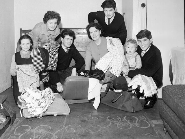 Mrs G Jamieson and family pack their bags at 259 Leith Walk in preparation to emmigrate to New Zealand in March 1963.