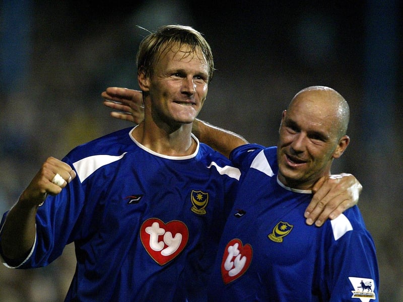 Striker Teddy Sheringham, pictured here with Steve Stone, joined Portsmouth for the 2003–04 Premier League season, bringing invaluable experience and intelligence to the squad. Even in the twilight of his career, he contributed crucial goals and calm leadership to help secure top-flight survival. His professionalism left a lasting impression on Pompey’s early Premier League years. He scored nine goals in 32 appearances for Pompey.