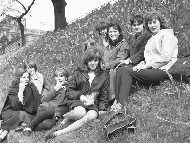 Edinburgh girls enjoy their sandwiches in Princes Street Gardens during the Spring Holiday in April 1966.