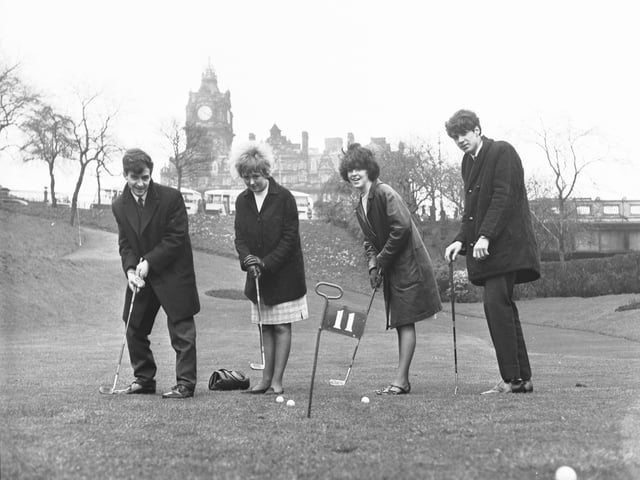Teenagers on the putting green in Princes Street Gardens in April 1966.