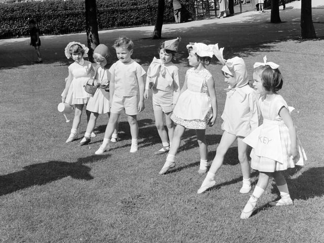 Young children dancing in Princes Street Gardens in August 1965.