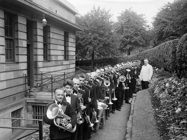 Markham Mains Colliery Band lines up in Princes Street Gardens in August 1963.