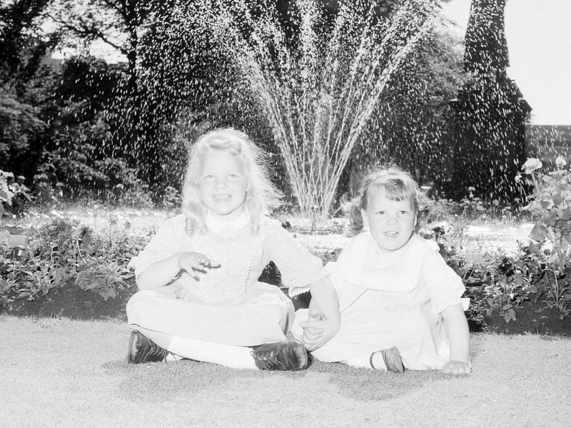 Katy and Kim Shackleford in front of a fountain in Princes Street Gardens in July 1961.